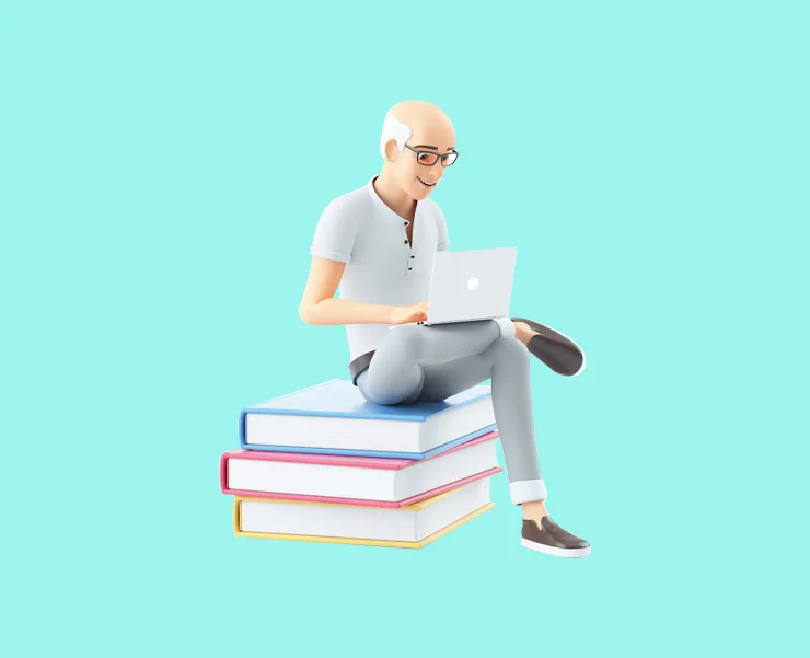 Bald man with glasses sitting on a stack of books, using a laptop, on a light blue background.