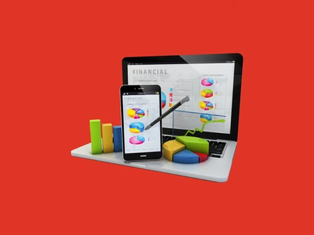 A laptop and smartphone displaying financial charts, with 3D pie charts and bar graphs placed in front, against a red background.