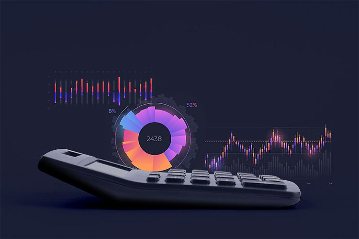 A calculator on a dark surface with colourful digital charts and graphs floating above it.